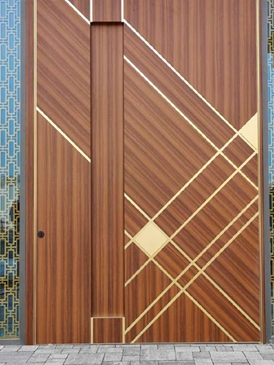 A wood-tone entrance design with crossing metallic lines and decorative side panels.